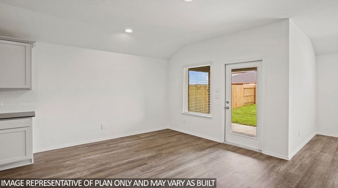 Representative unfurnished interior of a home built from the Texas Cali by D.R. Horton in Sunterra, Katy (Image 12).