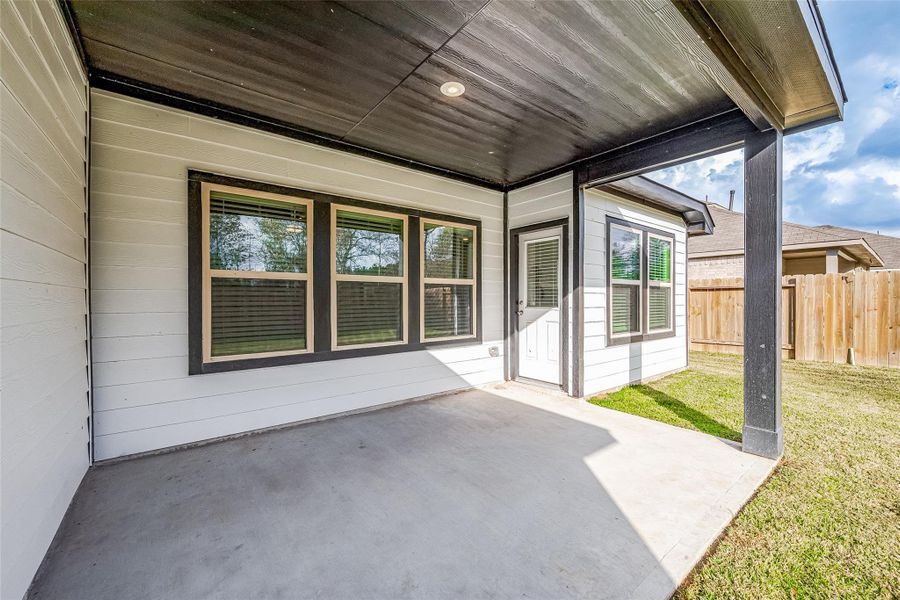 Exterior details and patio area of a home in Splendora Fields, Splendora (Image 32).