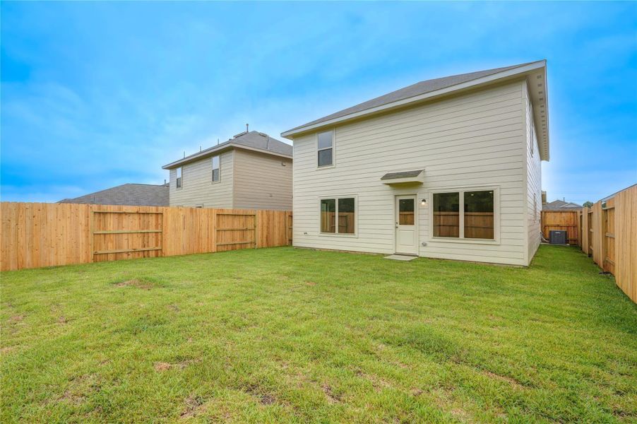 Exterior details and patio area of a home in Becker Landing, Hockley (Image 23).
