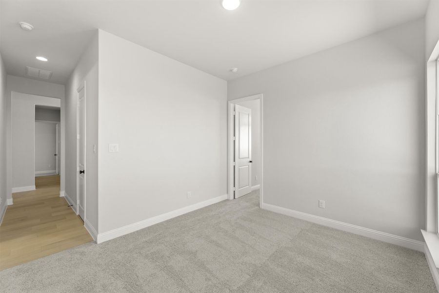 Representative unfurnished interior of a home built from the Wakefield by Windsor Homes in Nelson Lake Estates, Rockwall (Image 18).