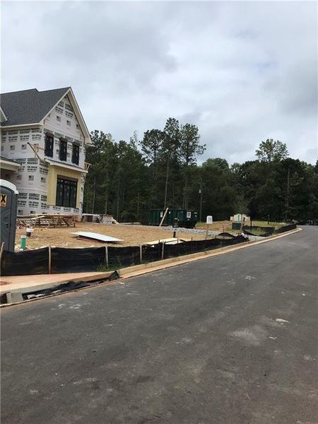 Front exterior of a new home in , Cumming, GA, highlighting curb appeal (Image 24). Front exterior of a new home in , Cumming, GA, highlighting curb appeal (Image 24).