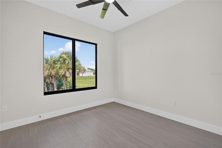 Spacious, unfurnished interior of a new home in , Port Charlotte (Image 22).