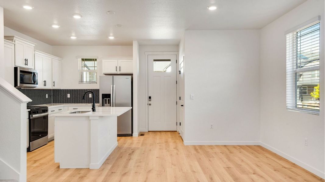 Furnished interior view inside a new home in Horizon Uptown, Aurora (Image 6).