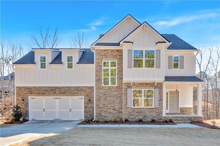 Front exterior of a new home in Carter Grove, Cartersville, GA, highlighting curb appeal (Image 1).