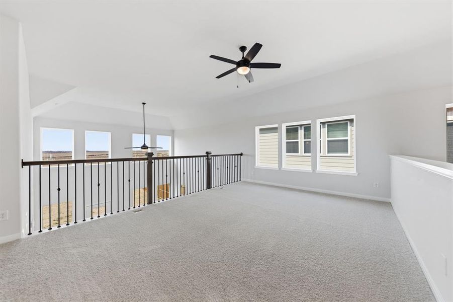 Light, bright and airy, the family fun time never ends in this over the top game room!