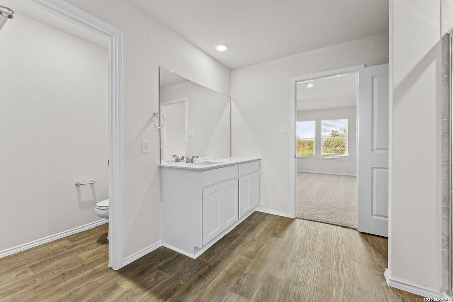 Furnished interior view inside a new home in Redbird Ranch, San Antonio (Image 9).