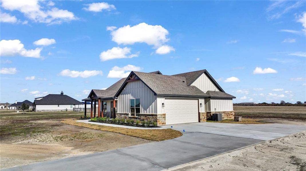 Front exterior of a new home in , Cresson, TX, highlighting curb appeal (Image 26).