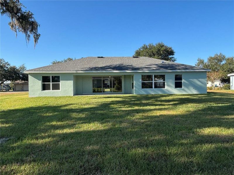 Exterior details and patio area of a home in , Brooksville (Image 3).