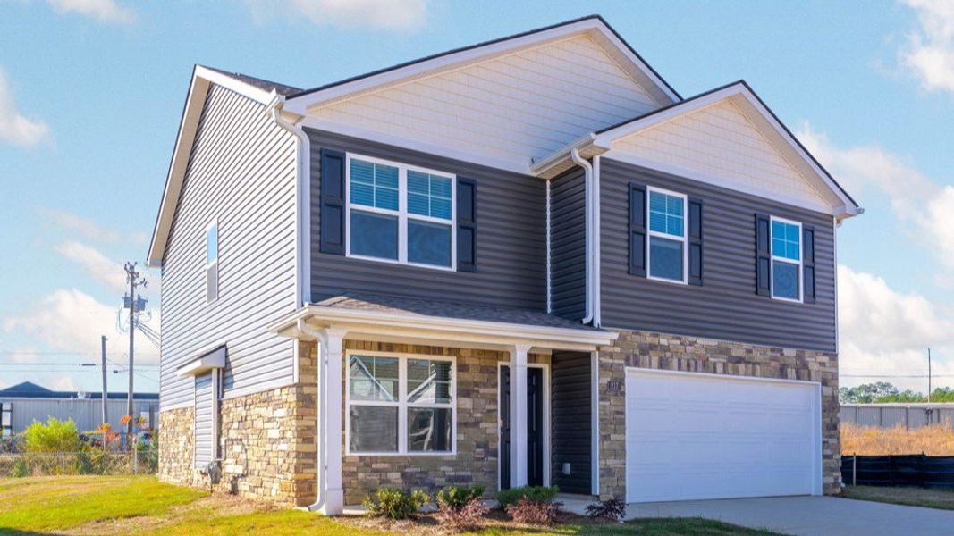 Front exterior of a new home in Price's Crossing, LaFayette, GA, highlighting curb appeal (Image 2).