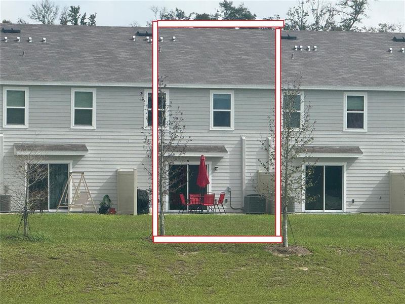 Exterior details and patio area of a home in The Towns at Laurel Commons, Ocala (Image 27).