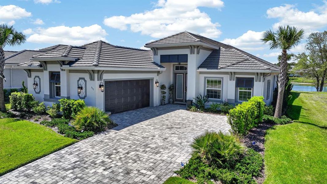 Front exterior of a new home in , Palm Coast, FL, highlighting curb appeal (Image 25).