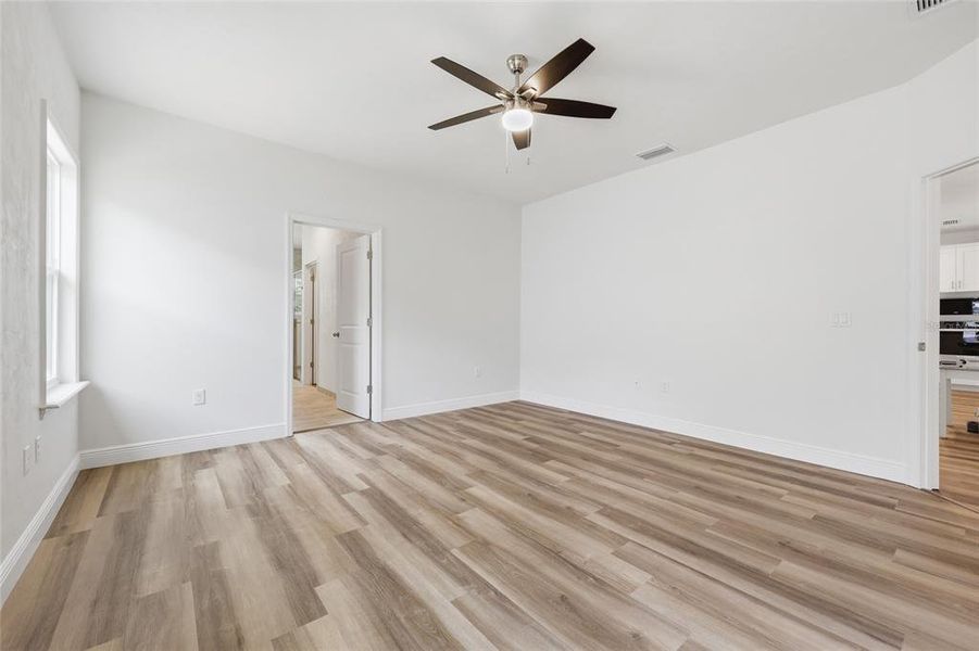 Spacious, unfurnished interior of a new home in Grand Oaks, Gainesville (Image 23).