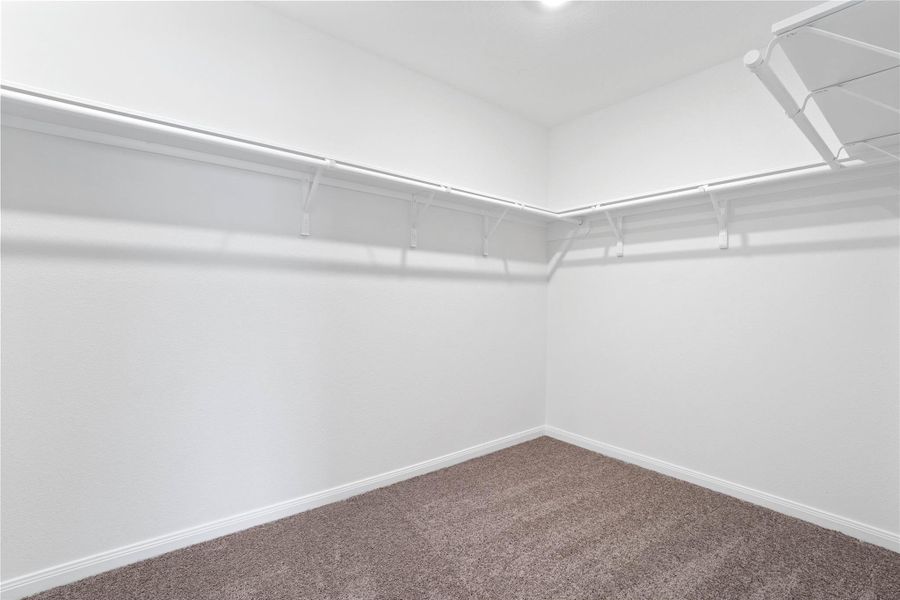 Look at this immaculate closet! With high shelving, multiple rows to hang clothing, you are sure to have enough room for all your belongings! Look at this immaculate closet! With high shelving, multiple rows to hang clothing, you are sure to have enough room for all your belongings!