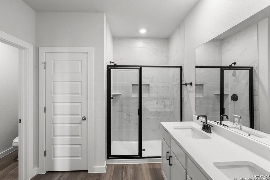 Furnished interior view inside a new home in August Fields, New Braunfels (Image 11).