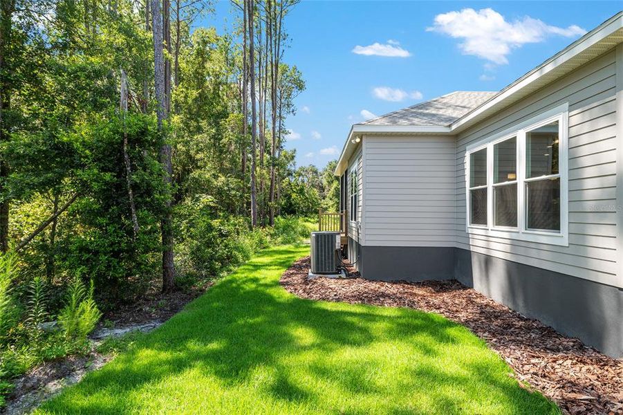 Front exterior of a new home in Fairway Pointe at West End, Newberry, FL, highlighting curb appeal (Image 33). Front exterior of a new home in Fairway Pointe at West End, Newberry, FL, highlighting curb appeal (Image 33).