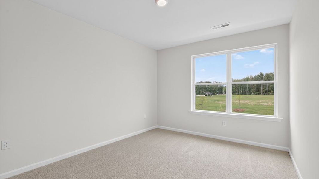 Representative unfurnished interior of a home built from the Blake by D.R. Horton in The Townes at Anderson Farm, Wendell (Image 27).