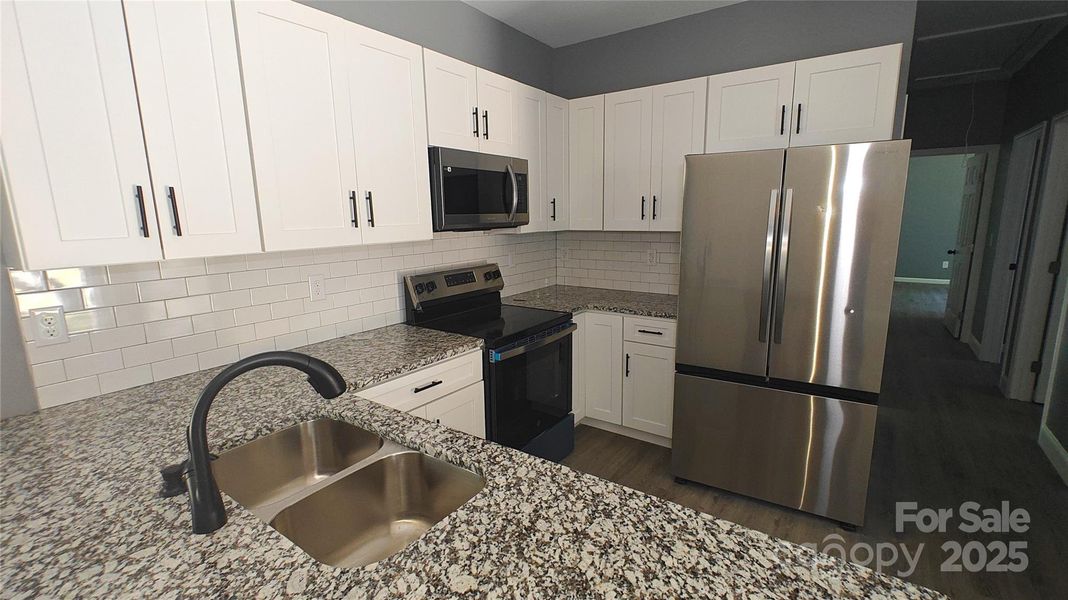 Furnished interior view inside a new home in , Gastonia (Image 6).