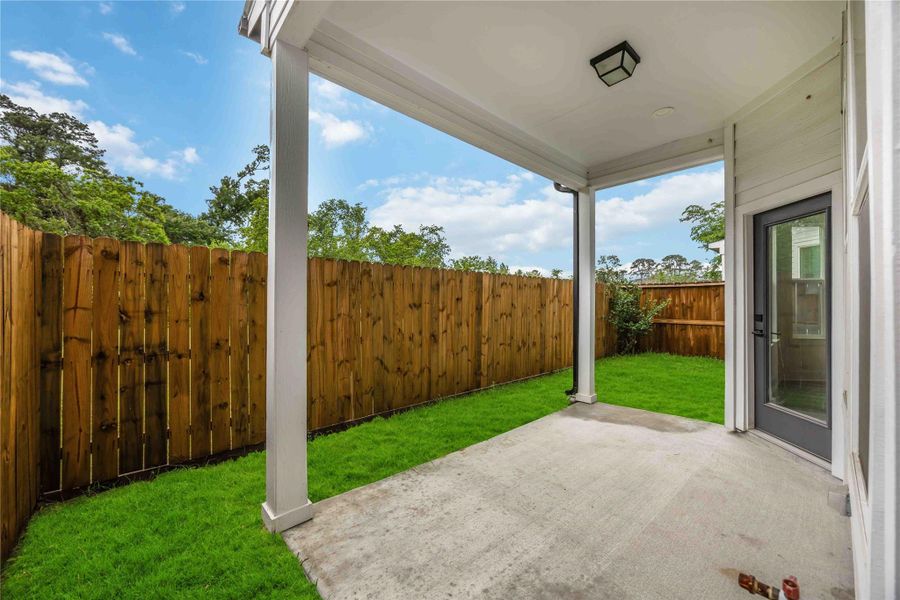 Exterior details and patio area of a home in , Houston (Image 2). Exterior details and patio area of a home in , Houston (Image 2).