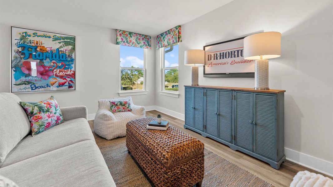 Representative furnished interior of a home built from the The Alabaster by D.R. Horton in WindMark Beach, Port Saint Joe (Image 27).