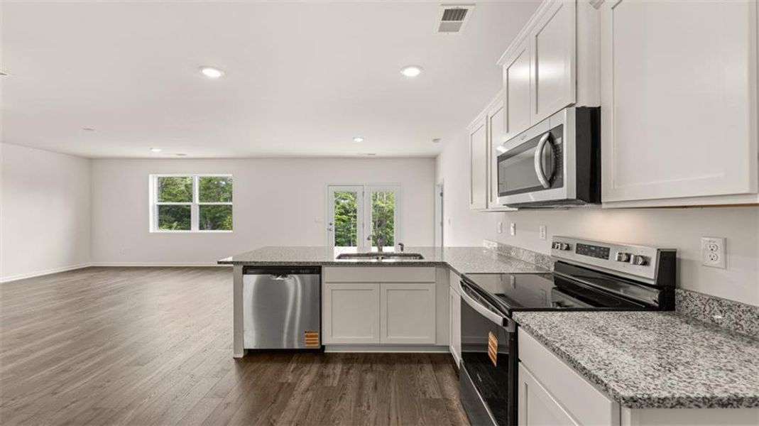 Furnished interior view inside a new home in Champion's Run, Lithonia (Image 11).