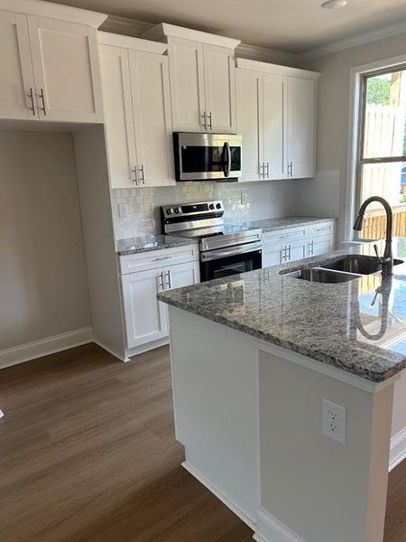 Furnished interior view inside a new home in Towns at Enclave, Lawrenceville (Image 8).