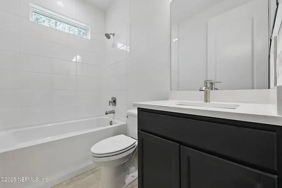 Furnished interior in a model home at Goose Creek Estates in Green Cove Springs (Image 7).