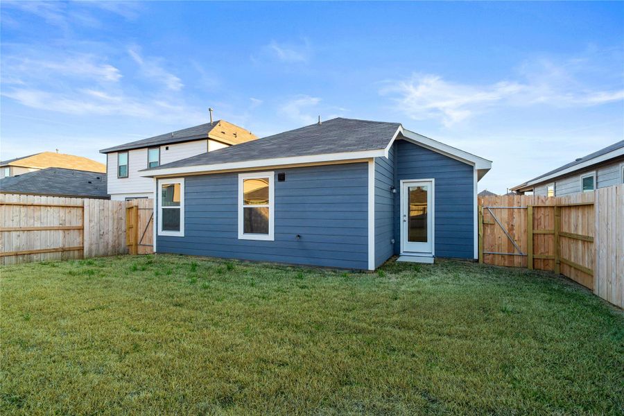 Come and see this spacious backyard. There is plenty of room for the kids to play and adults to relax!