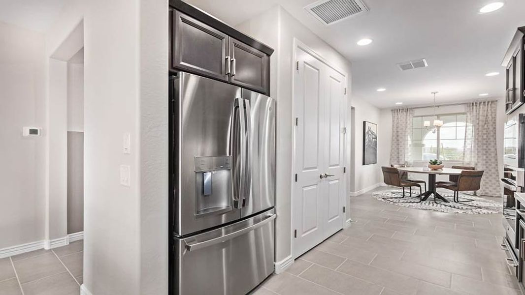 Representative furnished interior of a home built from the Edmonton by Taylor Morrison in Paradisi Discovery Collection, Surprise (Image 7). Representative furnished interior of a home built from the Edmonton by Taylor Morrison in Paradisi Discovery Collection, Surprise (Image 7).