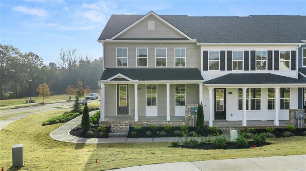 Front exterior of a new home in Brookland Commons, Monroe, GA, highlighting curb appeal (Image 25).