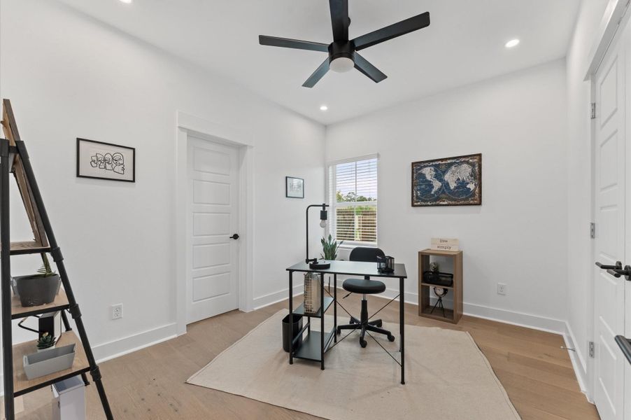 Comfortable and well-appointed secondary bedroom located on the first floor, featuring convenient access to a shared Jack and Jill bathroom Comfortable and well-appointed secondary bedroom located on the first floor, featuring convenient access to a shared Jack and Jill bathroom