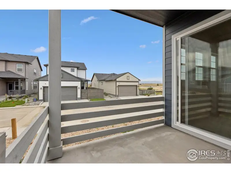 Exterior details and patio area of a home in Kinston Cottage, Loveland (Image 3).
