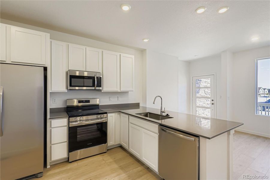 Furnished interior view inside a new home in Parterre: The Parkside Collection, Thornton (Image 6).