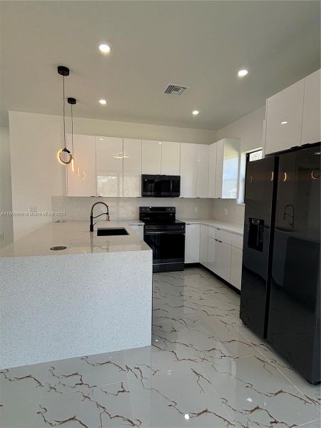 Furnished interior view inside a new home in , Lehigh Acres (Image 5). Furnished interior view inside a new home in , Lehigh Acres (Image 5).