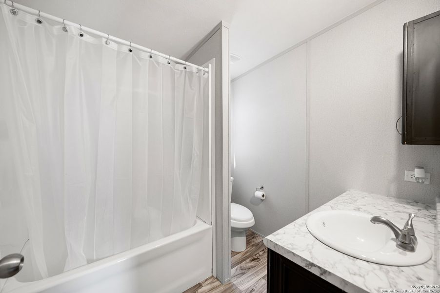 Furnished interior view inside a new home in , Elmendorf (Image 14).