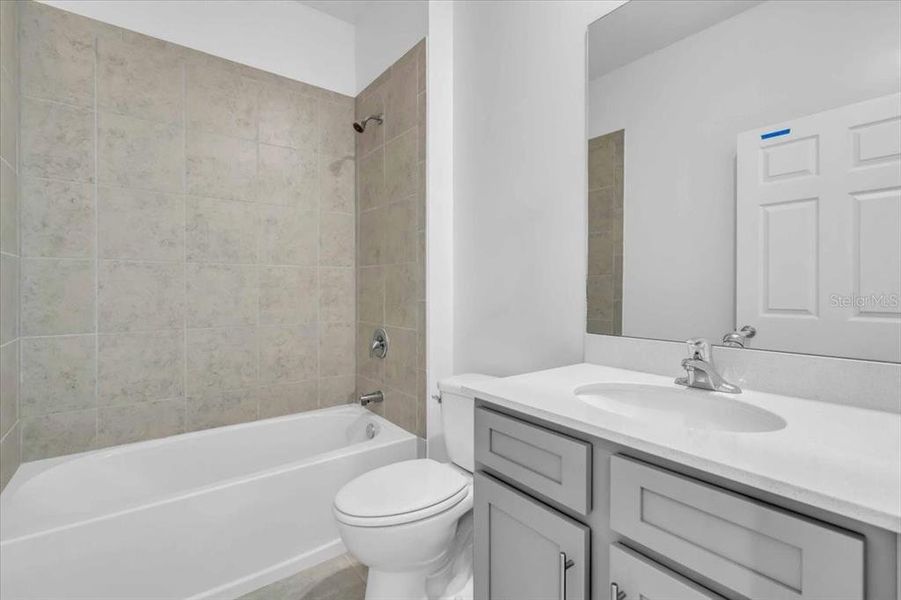 Furnished interior view inside a new home in The Residences at Emerson Park, Apopka (Image 9). Furnished interior view inside a new home in The Residences at Emerson Park, Apopka (Image 9).