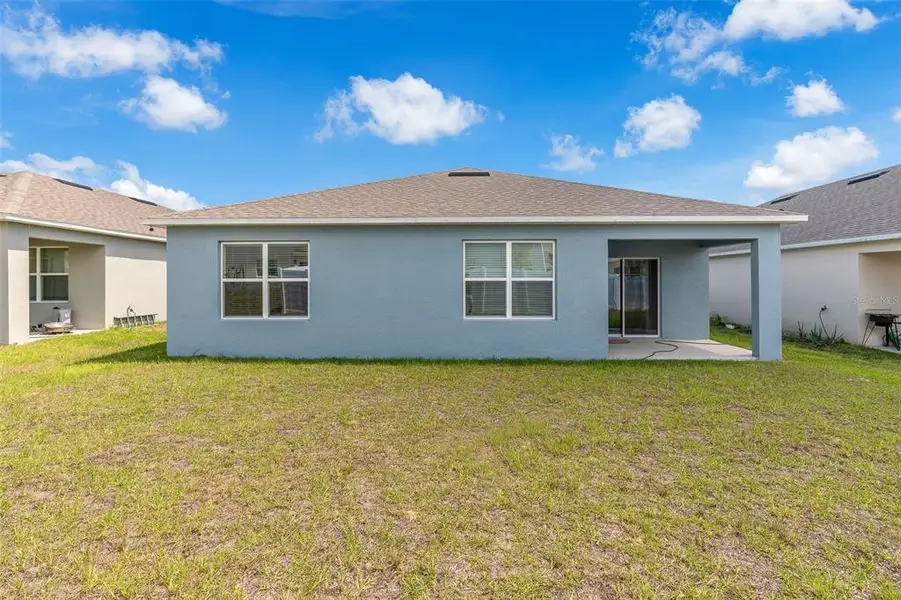 Exterior details and patio area of a home in Cypress Park Estates, Haines City (Image 4).