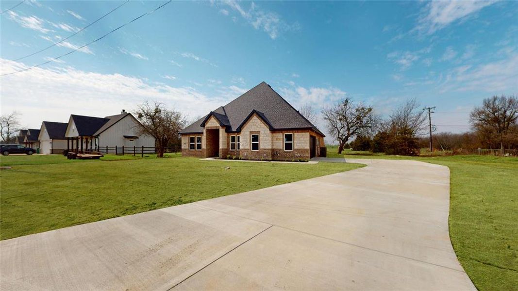 Front exterior of a new home in , Greenville, TX, highlighting curb appeal (Image 18).