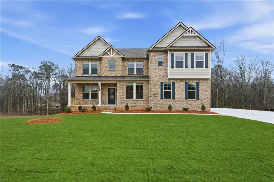 Front exterior of a new home in Trinity Park, McDonough, GA, highlighting curb appeal (Image 1). Front exterior of a new home in Trinity Park, McDonough, GA, highlighting curb appeal (Image 1).