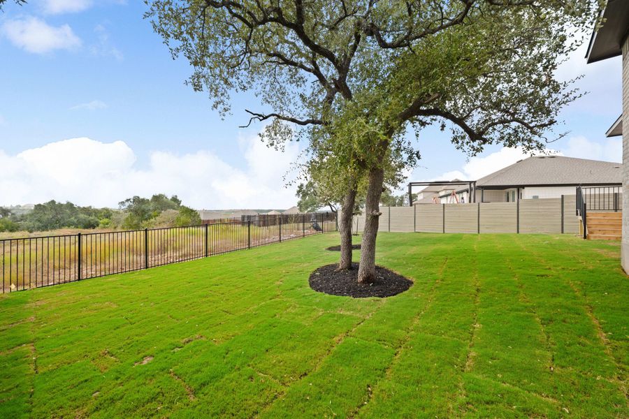 Exterior details and patio area of a home in Wolf Ranch, Georgetown (Image 29).