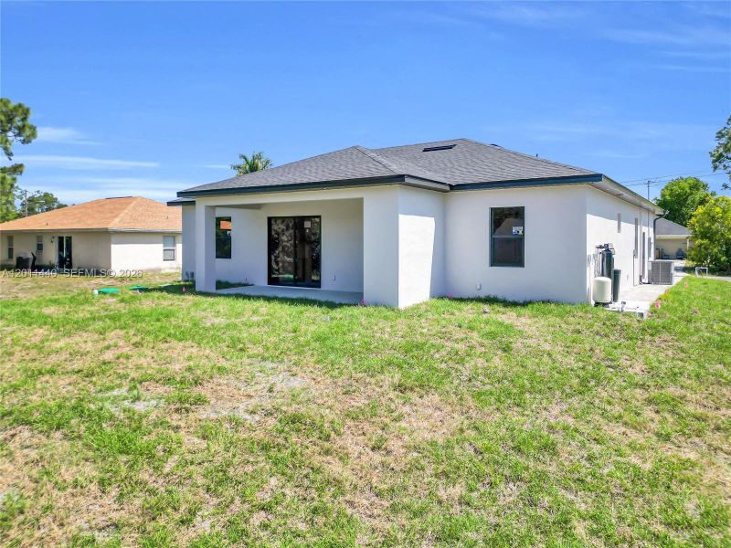Exterior details and patio area of a home in , Lehigh Acres (Image 3).