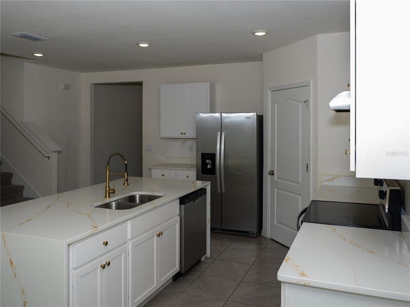 Furnished interior view inside a new home in Poinciana Enclave, Kissimmee (Image 6).