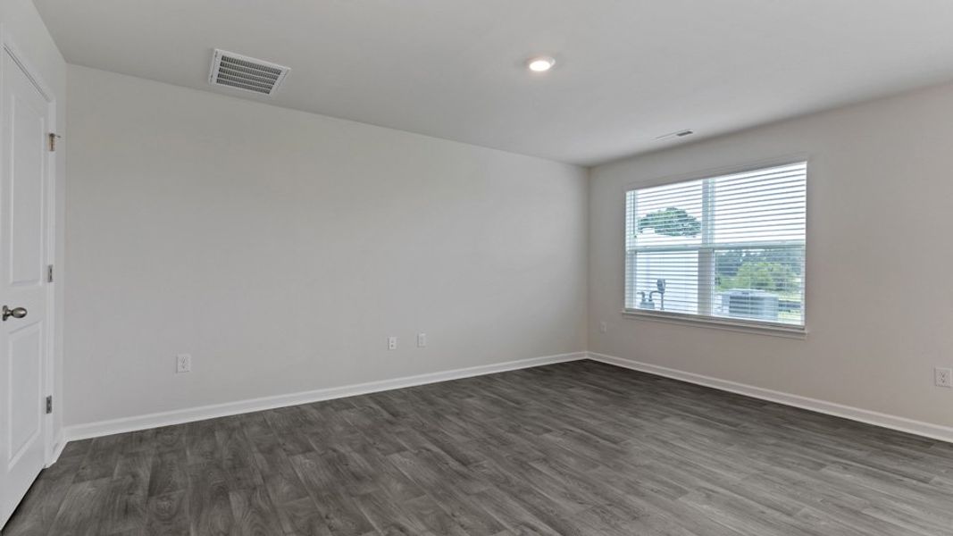 Spacious, unfurnished interior of a new home in The Townes at Honeycutt Oaks, Angier (Image 13).