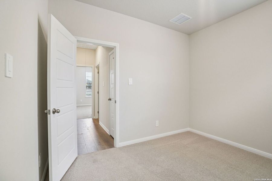 Spacious, unfurnished interior of a new home in Royal Crest, San Antonio (Image 32).