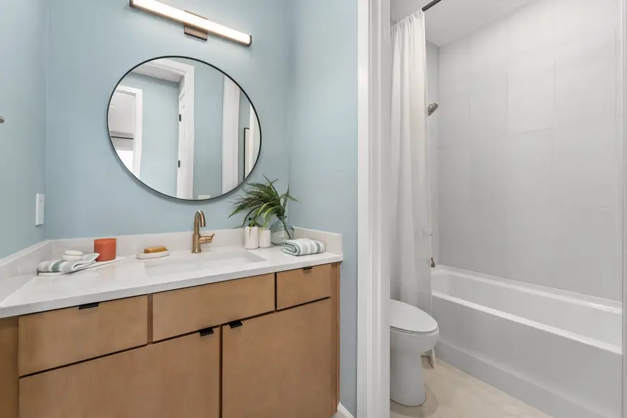 Representative furnished interior of a home built from the Seaglass by Tri Pointe Homes in EvenTide, New Smyrna Beach (Image 56).