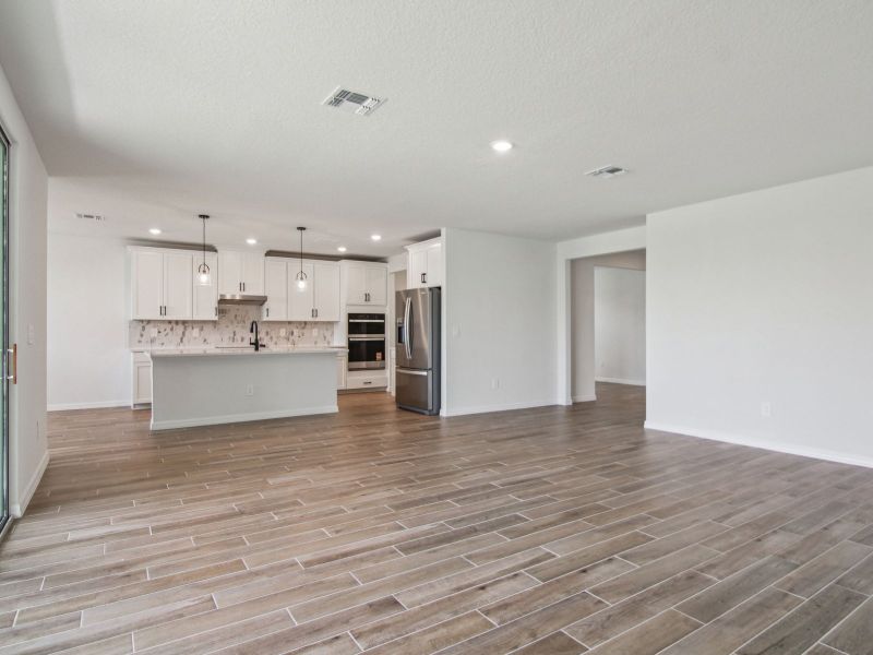 Spacious, unfurnished interior of a new home in Oakfield Trails - Signature Series, Parrish (Image 9). Spacious, unfurnished interior of a new home in Oakfield Trails - Signature Series, Parrish (Image 9).