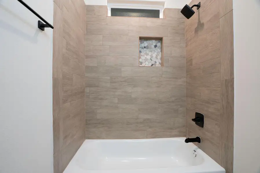 Full bath with shower / bath combination Full bath with shower / bath combination