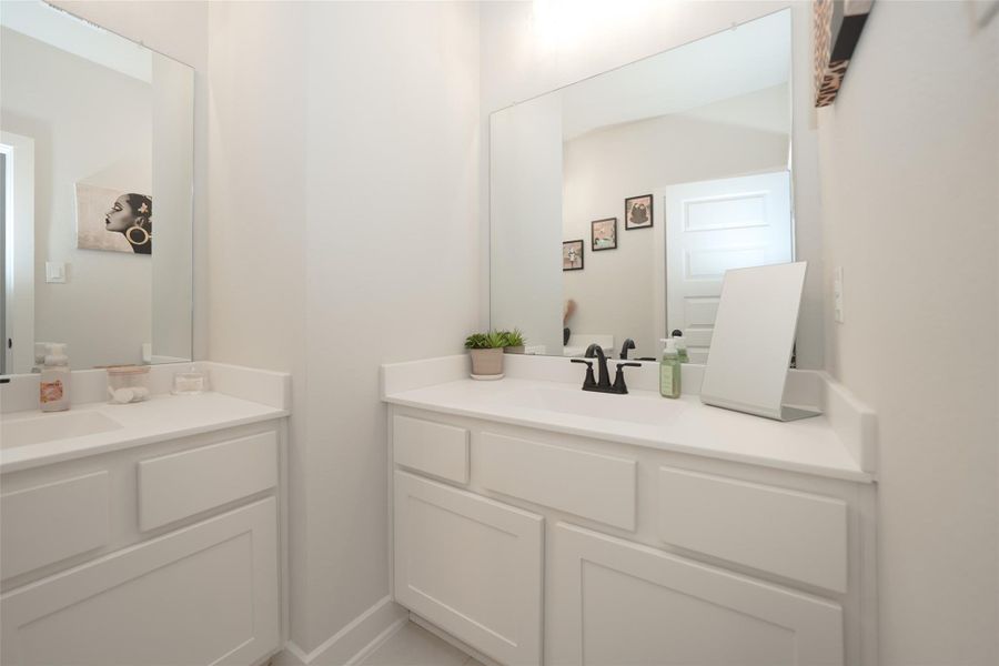 Furnished interior view inside a new home in Elyson, Katy (Image 34).