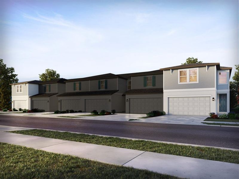 Front exterior of a new home in The Meadow at Crossprairie Townes, St. Cloud, FL, highlighting curb appeal (Image 1). Front exterior of a new home in The Meadow at Crossprairie Townes, St. Cloud, FL, highlighting curb appeal (Image 1).