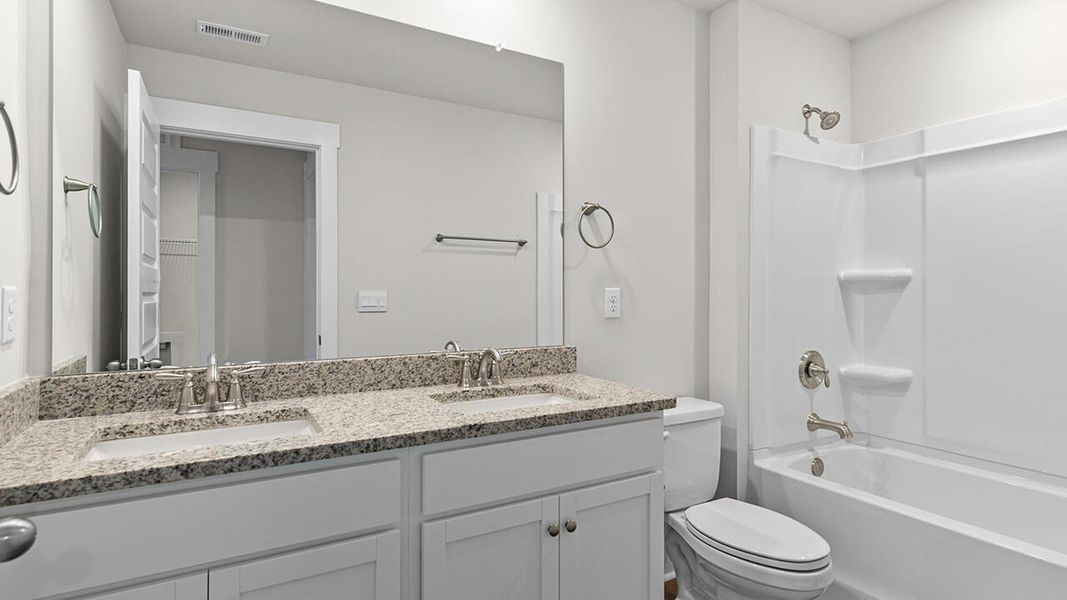 Furnished interior view inside a new home in Indigo Preserve, Leland (Image 14).