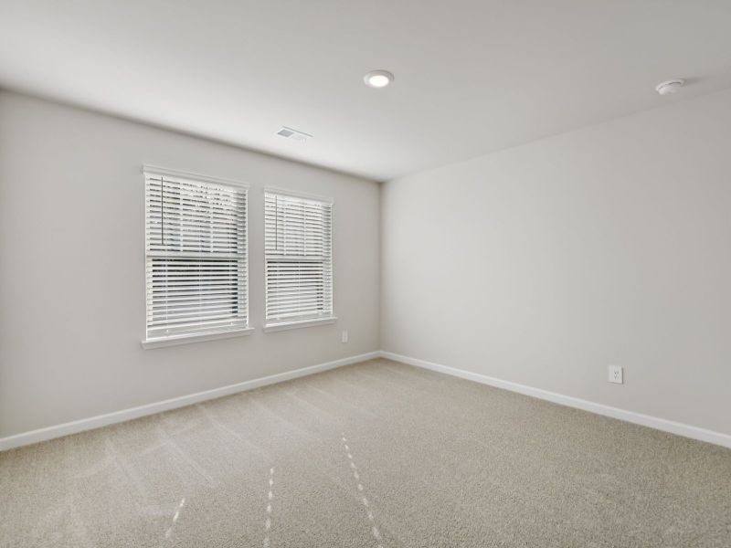 The Taylorsville floorplan with the Divine White interior package.